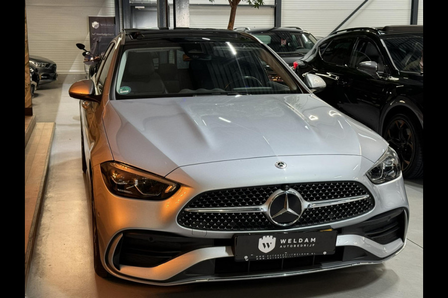 Mercedes-Benz C-Klasse Estate 300 e AMG Line Garantie Trekhaak Massage Pano Ambient 360 Blindspot Elek Achterklep StuurVW Rijklaar