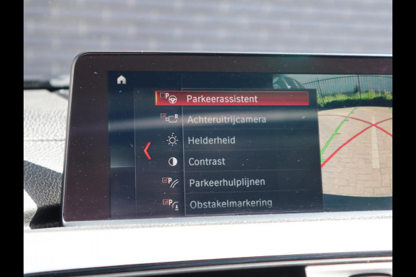 BMW 3 Serie Touring 320i High Executive M Sport Pakket Automaat / Panoramadak / Navigatie Professional / Leder / 19 Inch / Shadow Line / LED / Stoelverwarming / Lichtpakket / Achteruitrijcamera / Extra Getint Glas