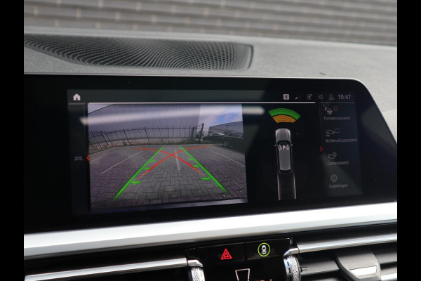 BMW 3 Serie Touring 320i High Executive M Sport Pakket Automaat / Live Cockpit Professional / Panoramadak / Leder / Adaptive Cruise Control / Head-Up Display / Apple CarPlay / 19 Inch / M Sportremsysteem / Shadow Line / LED / Extra Getint Glas / Stoelverwarming