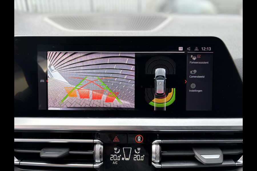 BMW 3 Serie Touring 330e High Executive M Sport Pakket Automaat / Panoramadak / Live Cockpit Professional / Stoelverwarming / Laser Light / 20" / M Performance Pack / Head-Up Display / Shadow Line / Extra Getint Glas