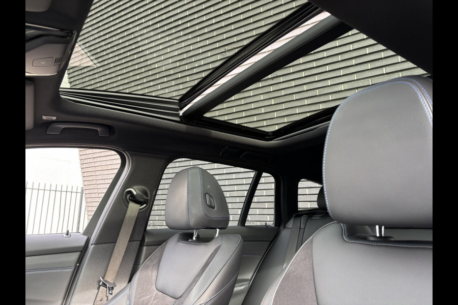 BMW 3 Serie Touring 330e High Executive M Sport Pakket Automaat / Panoramadak / Live Cockpit Professional / Stoelverwarming / Laser Light / 20" / M Performance Pack / Head-Up Display / Shadow Line / Extra Getint Glas