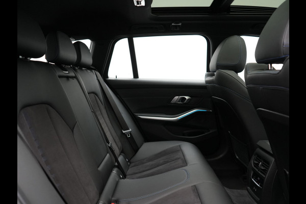 BMW 3 Serie Touring 320e M Sport Plug In Hybrid 204pk Dealer O.H. PHEV | Trekhaak Af Fabriek | Panodak | Camera | Adaptief Onderstel | 19"L.M | Alcantara Sportstoelen Memory & Verwarmd | Sfeerverlichting | Apple Carplay | Keyless | Navigatie | DAB |