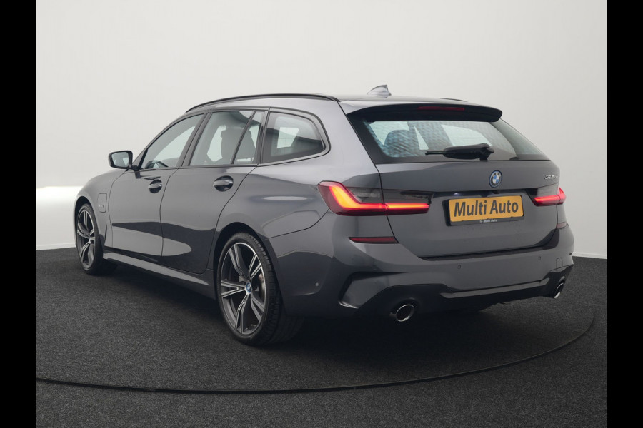 BMW 3 Serie Touring 320e M Sport Plug In Hybrid 204pk Dealer O.H. PHEV | Trekhaak Af Fabriek | Panodak | Camera | Adaptief Onderstel | 19"L.M | Alcantara Sportstoelen Memory & Verwarmd | Sfeerverlichting | Apple Carplay | Keyless | Navigatie | DAB |