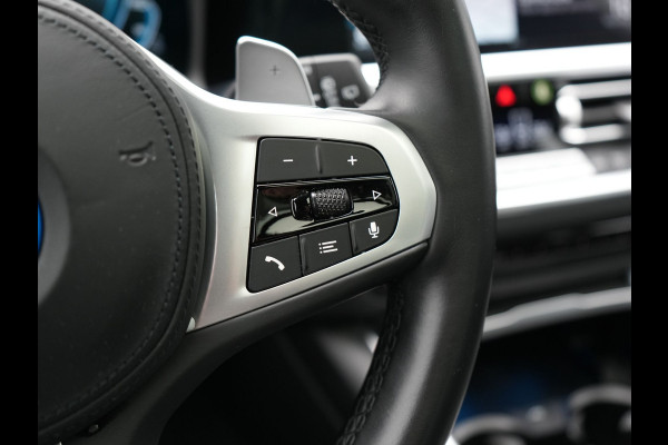 BMW 3 Serie Touring 320e M Sport Plug In Hybrid 204pk Dealer O.H. PHEV | Trekhaak Af Fabriek | Panodak | Camera | Adaptief Onderstel | 19"L.M | Alcantara Sportstoelen Memory & Verwarmd | Sfeerverlichting | Apple Carplay | Keyless | Navigatie | DAB |
