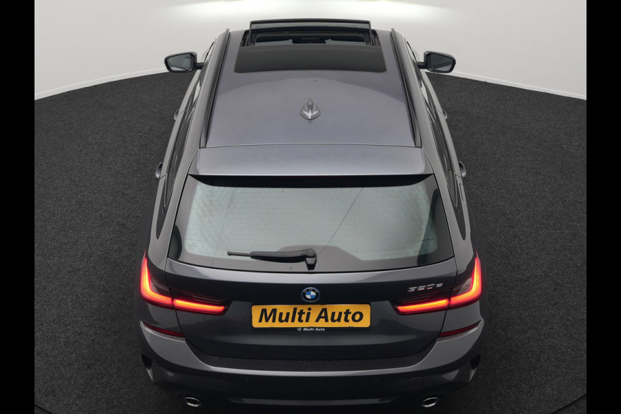 BMW 3 Serie Touring 320e M Sport Plug In Hybrid 204pk Dealer O.H. PHEV | Trekhaak Af Fabriek | Panodak | Camera | Adaptief Onderstel | 19"L.M | Alcantara Sportstoelen Memory & Verwarmd | Sfeerverlichting | Apple Carplay | Keyless | Navigatie | DAB |