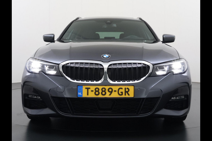 BMW 3 Serie Touring 320i VAN: €34.900,- VOOR: €31.877,- UW EINDEJAARSVOORDEEL: €3.023,-|M-SPORT| PANO| ADAP. CRUISE| NET GROOT ONDERHOUD GEHAD, RIJKLAAR| ELEK. ACHTERKLEP| CAMERA|