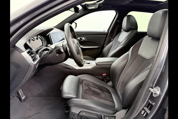 BMW 3 Serie Touring 320i VAN: €34.900,- VOOR: €31.877,- UW EINDEJAARSVOORDEEL: €3.023,-|M-SPORT| PANO| ADAP. CRUISE| NET GROOT ONDERHOUD GEHAD, RIJKLAAR| ELEK. ACHTERKLEP| CAMERA|