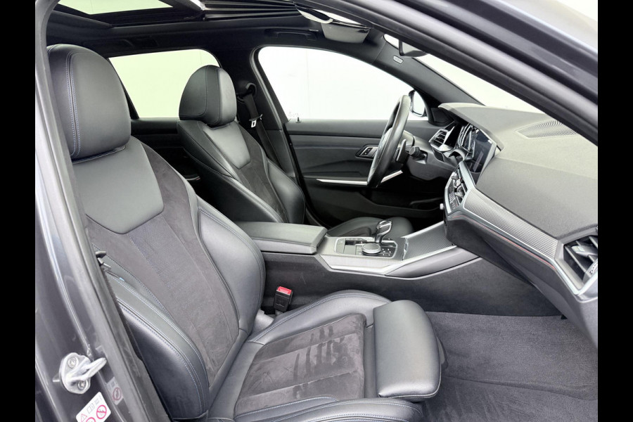 BMW 3 Serie Touring 320i VAN: €34.900,- VOOR: €31.877,- UW EINDEJAARSVOORDEEL: €3.023,-|M-SPORT| PANO| ADAP. CRUISE| NET GROOT ONDERHOUD GEHAD, RIJKLAAR| ELEK. ACHTERKLEP| CAMERA|