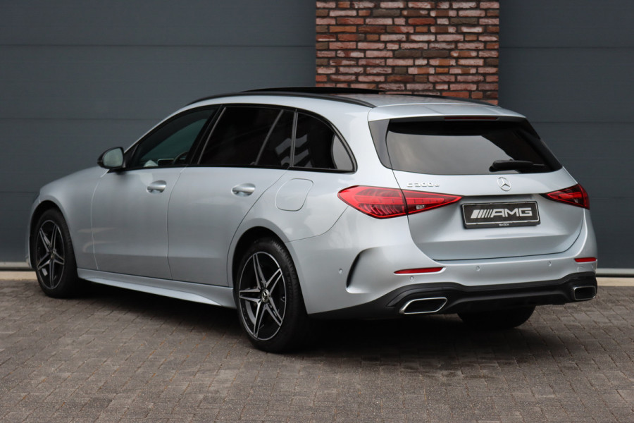 Mercedes-Benz C-Klasse Estate 300 e AMG Line Aut9 | Panoramadak | Distronic | Memory | Trekhaak | Leder | Camera | Sfeerverlichting | Dodehoekassistent | Stoelverwarming | High Perf. LED |