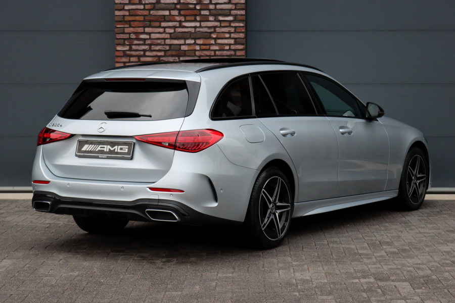 Mercedes-Benz C-Klasse Estate 300 e AMG Line Aut9 | Panoramadak | Distronic | Memory | Trekhaak | Leder | Camera | Sfeerverlichting | Dodehoekassistent | Stoelverwarming | High Perf. LED |