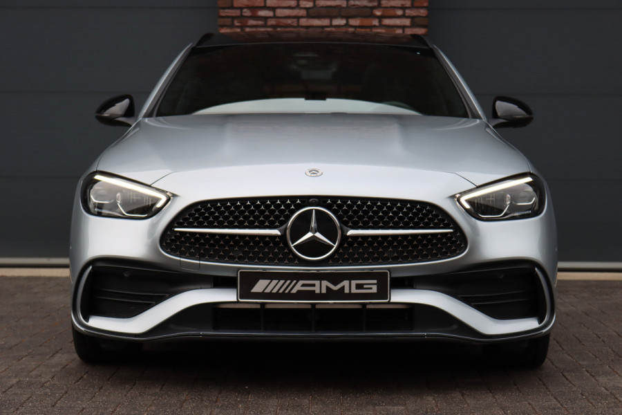 Mercedes-Benz C-Klasse Estate 300 e AMG Line Aut9 | Panoramadak | Distronic | Memory | Trekhaak | Leder | Camera | Sfeerverlichting | Dodehoekassistent | Stoelverwarming | High Perf. LED |