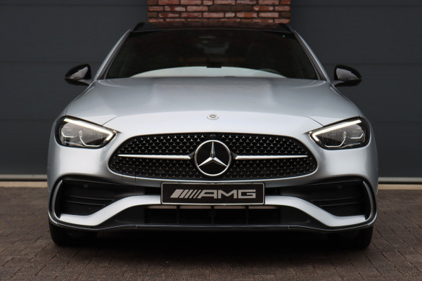 Mercedes-Benz C-Klasse Estate 300 e AMG Line Aut9 | Panoramadak | Distronic | Memory | Trekhaak | Leder | Camera | Sfeerverlichting | Dodehoekassistent | Stoelverwarming | High Perf. LED |