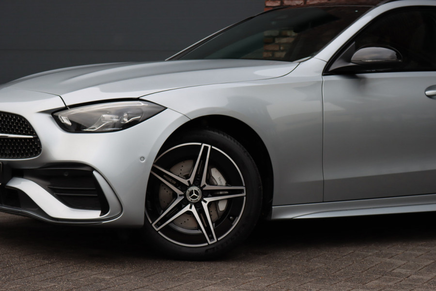 Mercedes-Benz C-Klasse Estate 300 e AMG Line Aut9 | Panoramadak | Distronic | Memory | Trekhaak | Leder | Camera | Sfeerverlichting | Dodehoekassistent | Stoelverwarming | High Perf. LED |