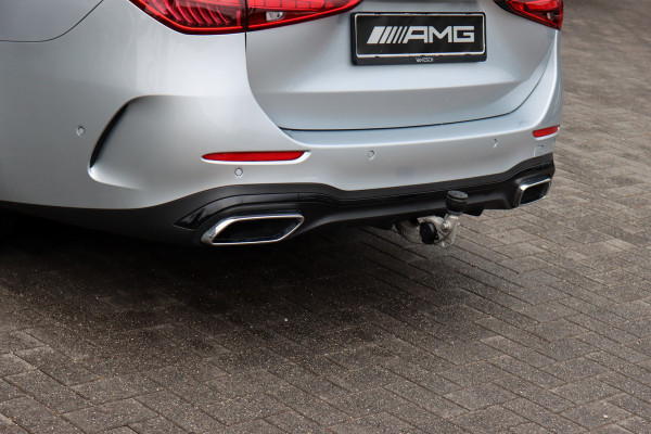 Mercedes-Benz C-Klasse Estate 300 e AMG Line Aut9 | Panoramadak | Distronic | Memory | Trekhaak | Leder | Camera | Sfeerverlichting | Dodehoekassistent | Stoelverwarming | High Perf. LED |