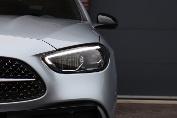 Mercedes-Benz C-Klasse Estate 300 e AMG Line Aut9 | Panoramadak | Distronic | Memory | Trekhaak | Leder | Camera | Sfeerverlichting | Dodehoekassistent | Stoelverwarming | High Perf. LED |