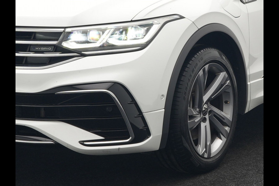 Volkswagen Tiguan 1.4 TSI eHybrid R-Line Business+ Plug In Hybrid 245pk Dealer O.H. PHEV | Panodak | Adaptive Cruise | 360 Camera | IQ Light | Lederen Stoelen Memory & Verwarmd | Apple Carplay | Stuur Verwarmd | Sfeerverlichting | Virtual | Navigatie | Blis | DAB |