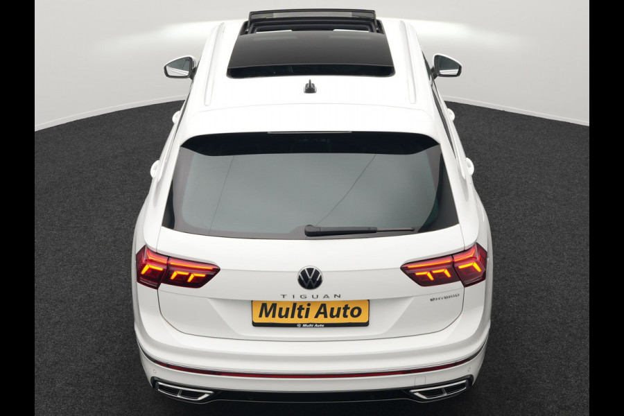 Volkswagen Tiguan 1.4 TSI eHybrid R-Line Business+ Plug In Hybrid 245pk Dealer O.H. PHEV | Panodak | Adaptive Cruise | 360 Camera | IQ Light | Lederen Stoelen Memory & Verwarmd | Apple Carplay | Stuur Verwarmd | Sfeerverlichting | Virtual | Navigatie | Blis | DAB |