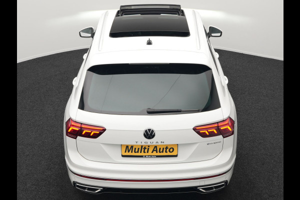 Volkswagen Tiguan 1.4 TSI eHybrid R-Line Business+ Plug In Hybrid 245pk Dealer O.H. PHEV | Panodak | Adaptive Cruise | 360 Camera | IQ Light | Lederen Stoelen Memory & Verwarmd | Apple Carplay | Stuur Verwarmd | Sfeerverlichting | Virtual | Navigatie | Blis | DAB |