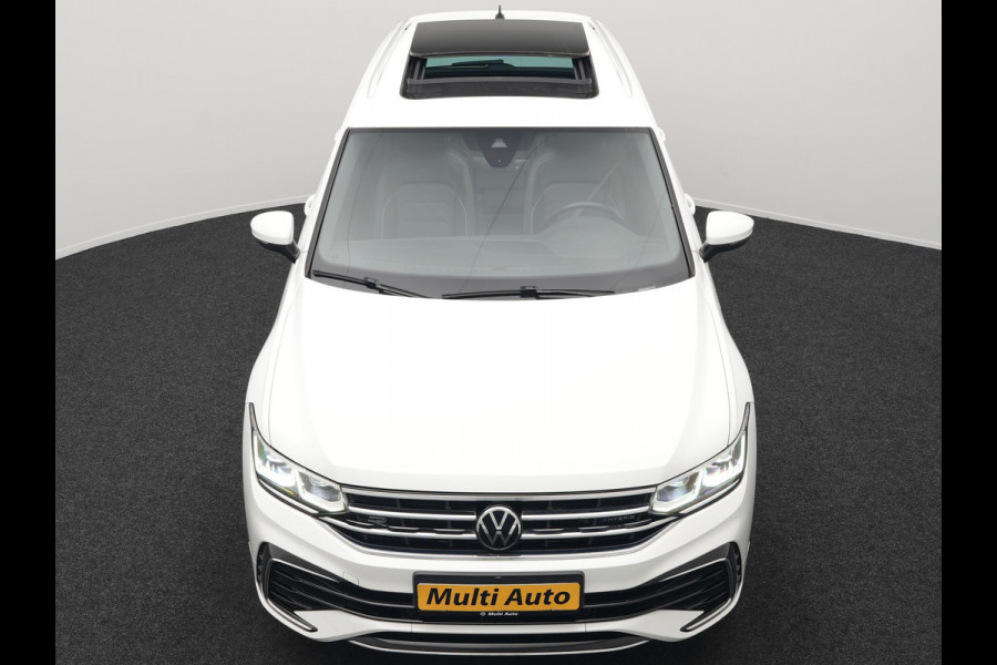 Volkswagen Tiguan 1.4 TSI eHybrid R-Line Business+ Plug In Hybrid 245pk Dealer O.H. PHEV | Panodak | Adaptive Cruise | 360 Camera | IQ Light | Lederen Stoelen Memory & Verwarmd | Apple Carplay | Stuur Verwarmd | Sfeerverlichting | Virtual | Navigatie | Blis | DAB |