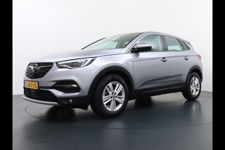 Opel Grandland X T 131pk 360Camera Navi 1/2Leer Apple/Android Usb Bluetooth CruiseControl Pdc Dab Ecc Tel. Isofix Mistlampen Blindspot Lane-dep. Bordherk. Licht-/Zichtpakket Elek.Inkl.spiegels Elek.Ramen Led 17''LM 1.2 Turbo Business Elegance NL-auto! B- klasse EURO 6 Origin.NLse auto