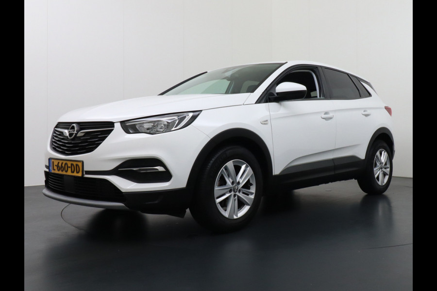 Opel Grandland X T131PK Apple Carplay Android Auto AGR-Comfortstoel Camera Navi Ecc Cruise Control Pdc DAB+ Regen-Lichtsensor Lane Assist Led Verkeersbord detectie Bluetooth Privacy Glas Lmv 17" Elegance 1e Eigenaar Origineel Nederlandse auto Euro 6