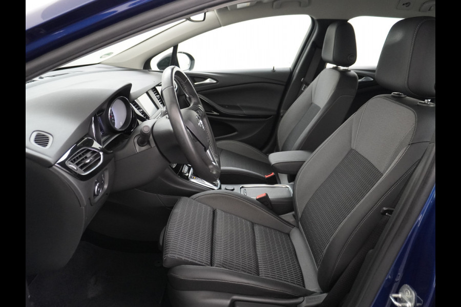 Opel Astra Sports Tourer 1.4T 145pk Navi Camera Lane-dep. Keyless 1/2Leer CruiseControl Led Bluetooth Pdc Apple/Android Aut.Verlichting Isofix Elek.Ramen Ecc Tel. Usb 16''LM Business Elegance