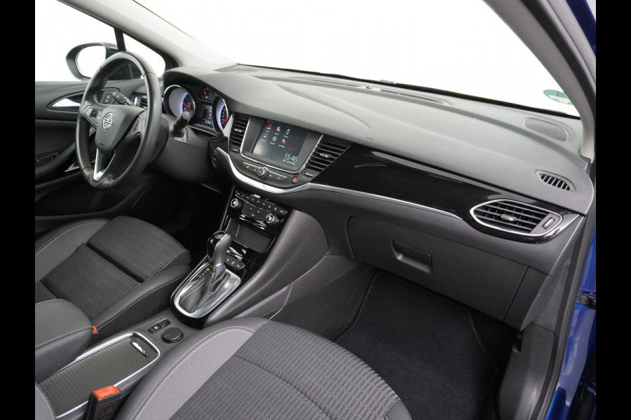 Opel Astra Sports Tourer 1.4T 145pk Navi Camera Lane-dep. Keyless 1/2Leer CruiseControl Led Bluetooth Pdc Apple/Android Aut.Verlichting Isofix Elek.Ramen Ecc Tel. Usb 16''LM Business Elegance