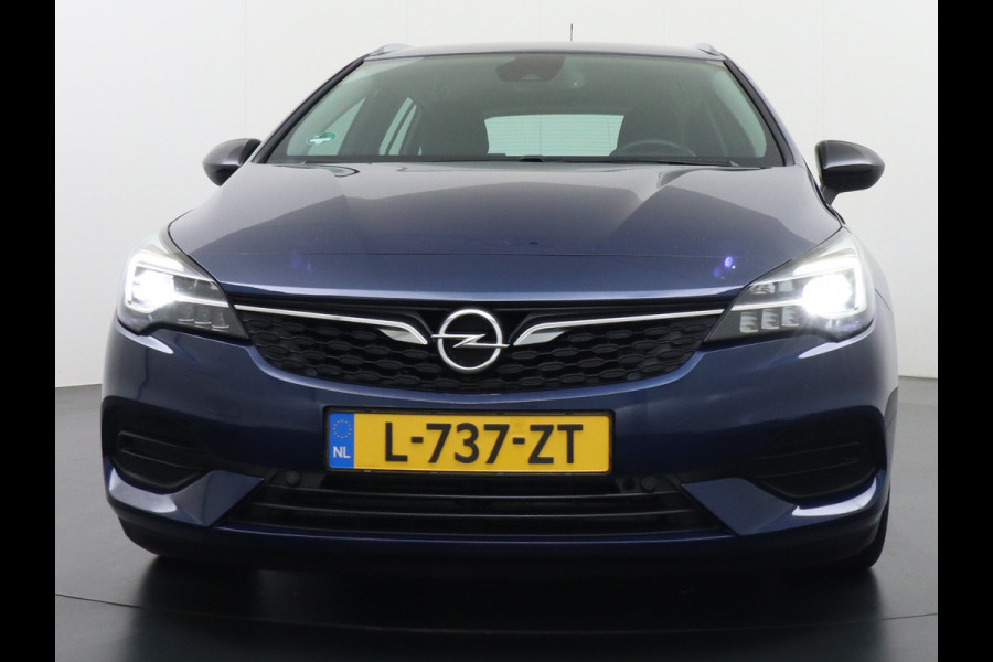 Opel Astra Sports Tourer 1.4T 145pk Navi Camera Lane-dep. Keyless 1/2Leer CruiseControl Led Bluetooth Pdc Apple/Android Aut.Verlichting Isofix Elek.Ramen Ecc Tel. Usb 16''LM Business Elegance