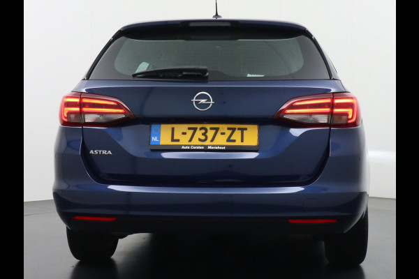 Opel Astra Sports Tourer 1.4T 145pk Navi Camera Lane-dep. Keyless 1/2Leer CruiseControl Led Bluetooth Pdc Apple/Android Aut.Verlichting Isofix Elek.Ramen Ecc Tel. Usb 16''LM Business Elegance