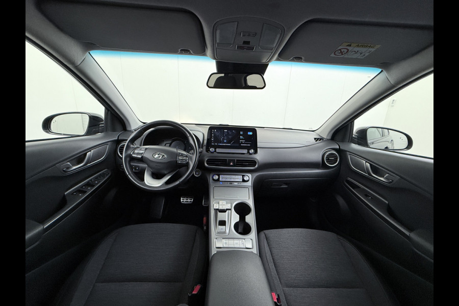 Hyundai Kona EV Fashion 64kWh SOH 100% Warmtepomp Head Up Display Adap.Cruise Navi Ecc Camera Apple Carplay Android Auto Pdc Lane Assist Dodehoekwaarschuwing Keyless Privacy Glas DAB FCA 1e Eigenaar Origineel Nederlandse Auto