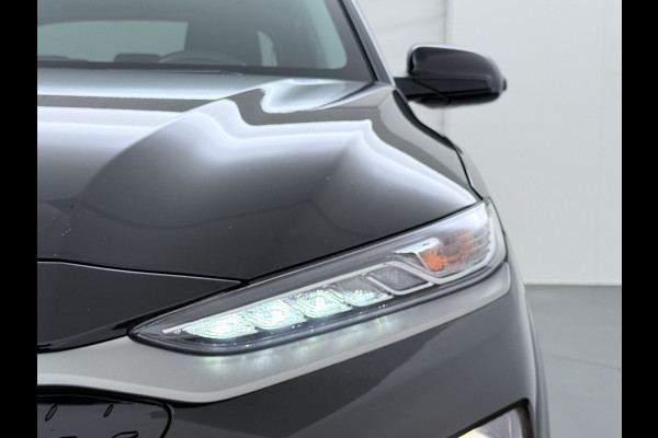Hyundai Kona EV Fashion 64kWh SOH 100% Warmtepomp Head Up Display Adap.Cruise Navi Ecc Camera Apple Carplay Android Auto Pdc Lane Assist Dodehoekwaarschuwing Keyless Privacy Glas DAB FCA 1e Eigenaar Origineel Nederlandse Auto
