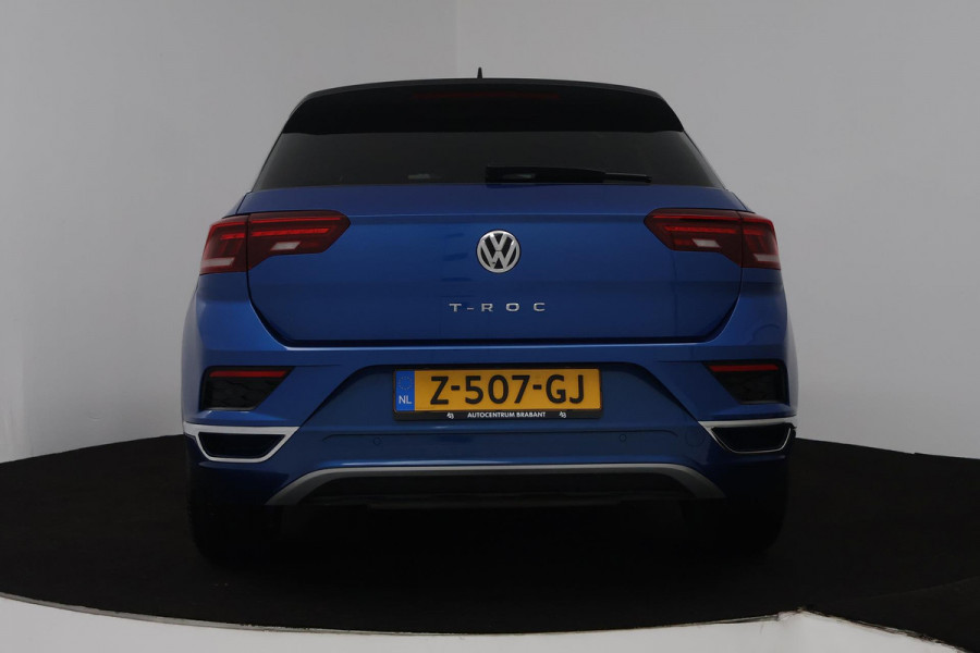 Volkswagen T-Roc 1.5 TSI Sport Business R (PANORAMADAK, STOEL/STUUR VERWARMING, DIGITALE COCKPIT, ACHTERUITRIJCAMERA)