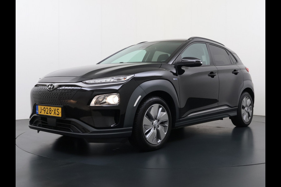 Hyundai Kona EV 64kWh SOH 100% Warmtepomp Head Up Display Adap.Cruise Navi Ecc Camera Apple Carplay Android Auto Pdc Fashion Lane Assist Dodehoekwaarschuwing Keyless Privacy Glas DAB FCA 1e Eigenaar Origineel Nederlandse Auto
