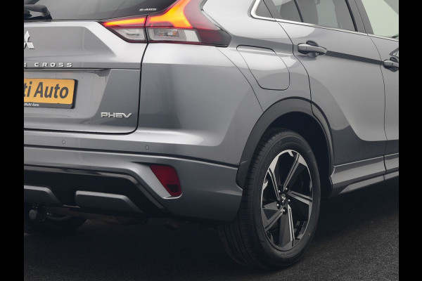Mitsubishi Eclipse Cross 2.4 Instyle Plug In Hybrid 188pk Dealer O.H. PHEV | Trekhaak Afn. | Panodak | Head Up | Adaptive Cruise | 360 Camera | Lederen Sportstoelen & Stuur Verwarmd | Apple Carplay | Navigatie Via TomTom | Keyless | Blis | DAB |