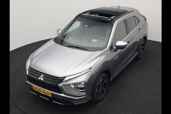 Mitsubishi Eclipse Cross 2.4 Instyle Plug In Hybrid 188pk Dealer O.H. PHEV | Trekhaak Afn. | Panodak | Head Up | Adaptive Cruise | 360 Camera | Lederen Sportstoelen & Stuur Verwarmd | Apple Carplay | Navigatie Via TomTom | Keyless | Blis | DAB |