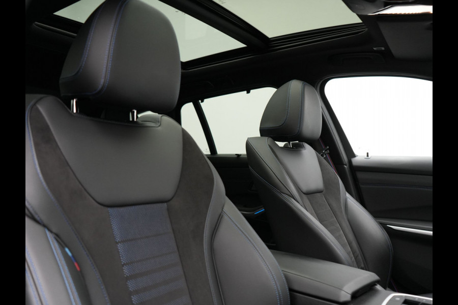 BMW 3 Serie Touring 320e M Sport Plug In Hybrid 204pk Dealer O.H. PHEV | Trekhaak Af Fabriek | Panodak | Adaptive Cruise | Alcantara Sportstoelen |  18"L.M | Apple Carplay | Keyless | Navigatie | Sfeerverlichting | Virtual | DAB |
