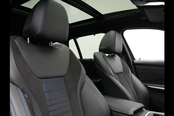 BMW 3 Serie Touring 320e M Sport Plug In Hybrid 204pk Dealer O.H. PHEV | Trekhaak Af Fabriek | Panodak | Adaptive Cruise | Alcantara Sportstoelen |  18"L.M | Apple Carplay | Keyless | Navigatie | Sfeerverlichting | Virtual | DAB |