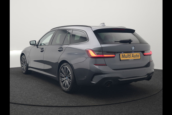 BMW 3 Serie Touring 320e M Sport Plug In Hybrid 204pk Dealer O.H. PHEV | Trekhaak Af Fabriek | Panodak | Adaptive Cruise | Alcantara Sportstoelen |  18"L.M | Apple Carplay | Keyless | Navigatie | Sfeerverlichting | Virtual | DAB |