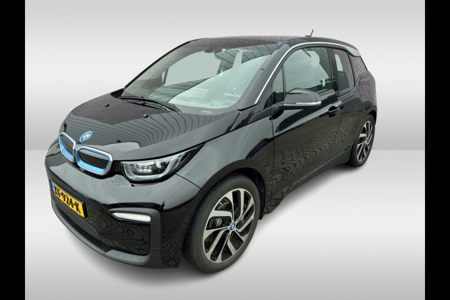 BMW i3 Basis 120Ah 42 kWh / Navigatie / 19'' / Parkeerhulp achter / Navigatie / Harman Kardon / Stoelverwarming / Cruise Control / Warmtepomp / Getint glas