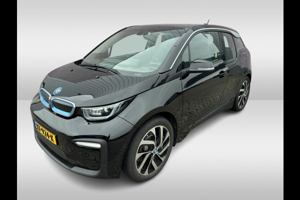BMW i3 Basis 120Ah 42 kWh / Navigatie / 19'' / Parkeerhulp achter / Navigatie / Harman Kardon / Stoelverwarming / Cruise Control / Warmtepomp / Getint glas