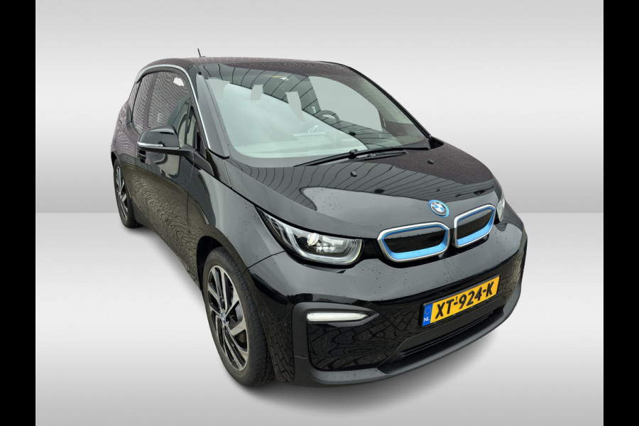 BMW i3 Basis 120Ah 42 kWh / Navigatie / 19'' / Parkeerhulp achter / Navigatie / Harman Kardon / Stoelverwarming / Cruise Control / Warmtepomp / Getint glas