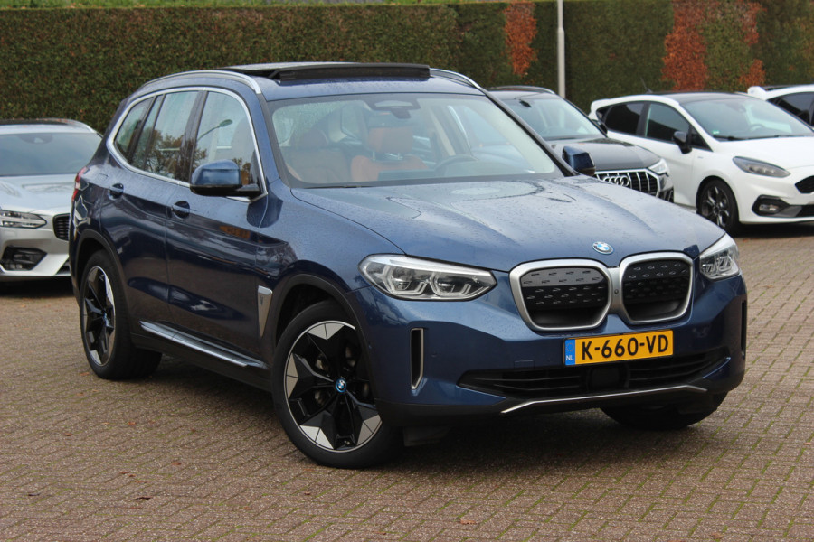 BMW iX3 Executive 80 kWh / SoH 95.5% / Panoramadak / Camera / Head-up / 20'' / Leder / Harman Kardon / Navigatie / Memory seats / Dodehoek / DAB / Stoelverwarming / Cruise Control Adaptief