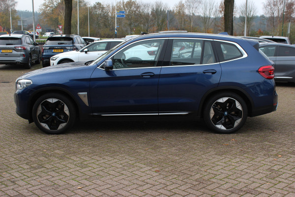 BMW iX3 Executive 80 kWh / SoH 95.5% / Panoramadak / Camera / Head-up / 20'' / Leder / Harman Kardon / Navigatie / Memory seats / Dodehoek / DAB / Stoelverwarming / Cruise Control Adaptief