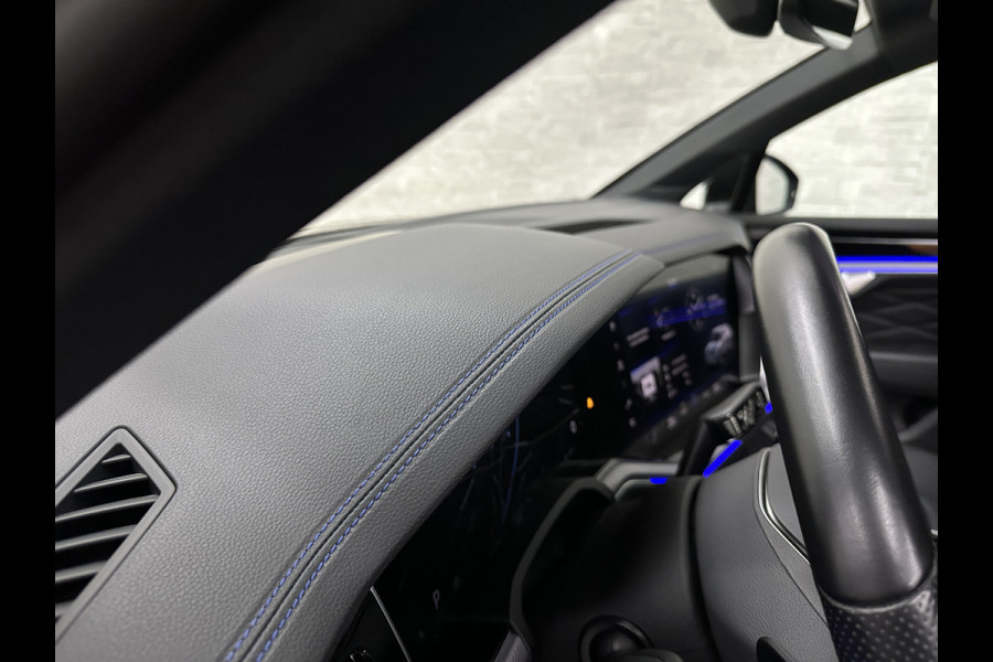 Volkswagen Touareg R 3.0 TSI 462PK E-Hybrid | Luchtvering | Puglia Leder | Panorama | ACC | Trekhaak | 22'' | Stoelventilatie | Nachtzicht | Head-Up | Standkachel | Ergo-Comfort | Sfeerverlichting | 4-Zone Clima | Stuurverwarming | Black-Optic | Dodehoek | Lane-Assist | Carplay | Draadloos Laden | BOVAG Garantie |