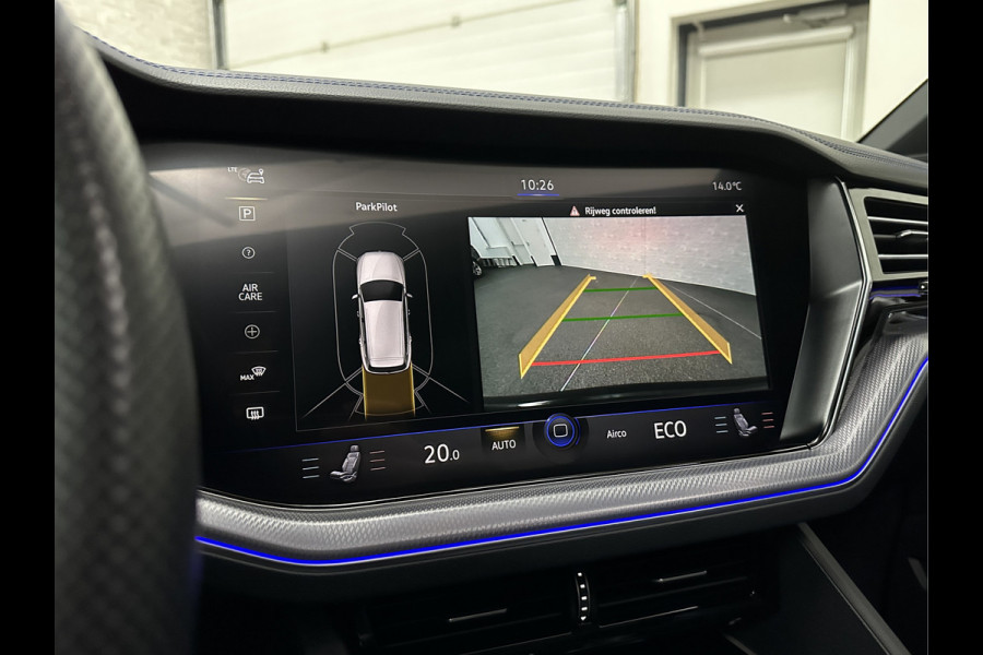 Volkswagen Touareg R 3.0 TSI 462PK E-Hybrid | Luchtvering | Puglia Leder | Panorama | ACC | Trekhaak | 22'' | Stoelventilatie | Nachtzicht | Head-Up | Standkachel | Ergo-Comfort | Sfeerverlichting | 4-Zone Clima | Stuurverwarming | Black-Optic | Dodehoek | Lane-Assist | Carplay | Draadloos Laden | BOVAG Garantie |