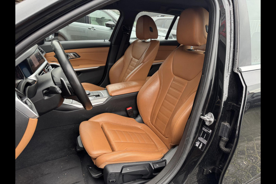 BMW 3 Serie Touring 320i High Executive M-Sport | Camera | Navigatie | DAB | 19 Inch Lichtmetalen Velgen | Lederen Bekleding |