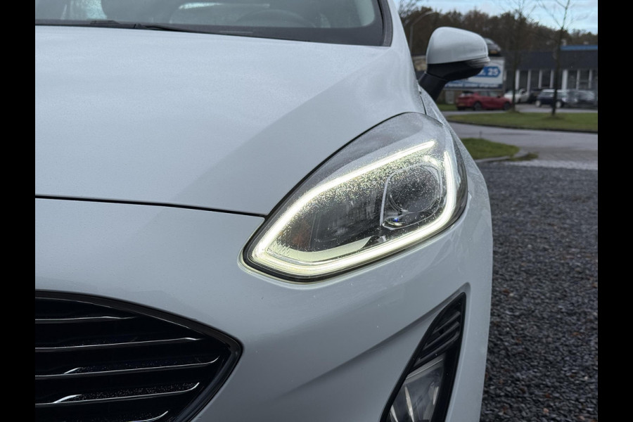 Ford Fiesta 1.0 EcoBoost Titanium 2e Eigenaar,Camera,Navi,Clima,Cruise,6 Bak,Lm velgen,Pdc V+A,N.A.P,102pk,B&O Soundsystem,Weinig km,Zeer Zuinig,Apk tot 11-2026