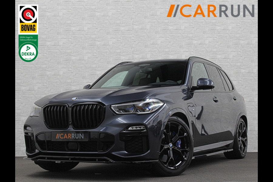BMW X5 45e M-Stoelen | M-Performance | 360 Camera | ACC | Indiv. Leder | Harman-Kardon | Laser-LED | Keyless-Entry | Stoelventilatie | Head-Up | Memory | 21'' | Sfeerverlichting | Trekhaak | Luchtvering | Rij-Assistent Pro | Carplay | Black-Optic | Draadloos Laden.