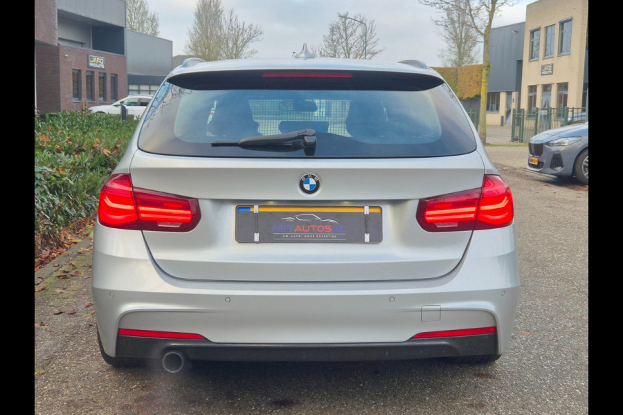 BMW 3 Serie Touring M Sport Apple CarPlay dig.dash Navi GR NAP NL 318i Edition M Sport Shadow Executive