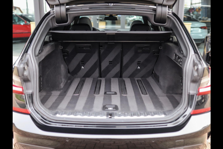 BMW 3 Serie Touring 320d xDrive High Executive | M-Sport | Camera | Trekhaak | Pano | Keyless